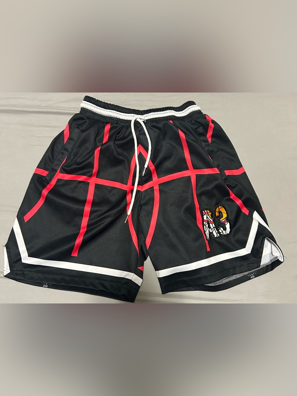 A3 Apparels Black Athletic Shorts with Red Grid Stripe &White Trim-size s/m